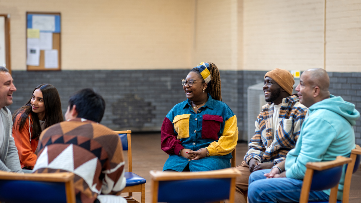 Community support group meets and laughs together